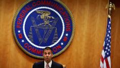 Chairman Ajit Pai speaks ahead of the vote on the repeal of so called net neutrality rules at the Federal Communications Commission in Washington, U.S., December 14, 2017. REUTERS/Aaron P. Bernstein