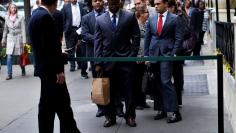 Job seekers stand in line to meet with prospective employers at a career fair in New York City, October 24, 2012.   REUTERS/Mike Segar  