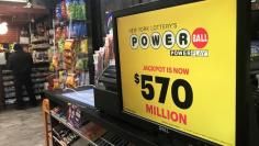 A Powerball sign is pictured in a store in New York City, New York, U.S., January 5, 2018. REUTERS/Carlo Allegri