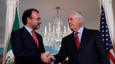U.S. Secretary of State Rex Tillerson greets Mexican Foreign Minister Luis Videgaray at the State Department in Washington, U.S., August 30, 2017. REUTERS/Aaron P. Bernstein