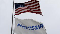 Flags fly outside the Navistar Proving Grounds in New Carlisle, Indiana, U.S., October 12, 2016. REUTERS/Jim Young 