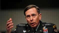 FILE PHOTO - U.S. General David Petraeus, commander of the international security assistance force and commander of U.S. Forces in Afghanistan, testifies at a Senate Armed Services committee hearing on the situation in Afghanistan, on Capitol Hill in Wash