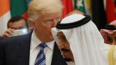 U.S. President Donald Trump and Saudi Arabia's King Salman bin Abdulaziz Al Saud (R) attend the Arab Islamic American Summit in Riyadh, Saudi Arabia May 21, 2017. REUTERS/Jonathan Ernst