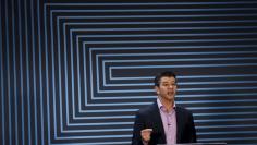 Uber CEO Travis Kalanick  gestures as he delivers an address to employees and drivers marking the company's five year anniversary in San Francisco, California June 3, 2015.  REUTERS/Robert Galbraith 