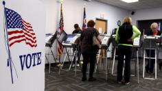 Ohio voters cast their votes at the polls for early voting in the 2012 U.S. presidential election in Medina Ohio