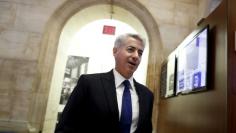 FILE PHOTO - William Ackman, chief executive of Pershing Square walks on the floor of the New York Stock Exchange, New York, U.S. on November 10, 2015. REUTERS/Brendan McDermid/File Photo