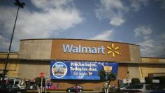 Wal-Mart shaken by bribery probe, shares plunge
