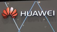 Insight: Outsider Ren pits Huawei against the world