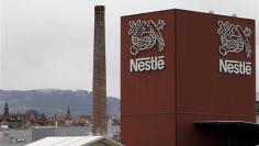 Nestle wins pricey battle for Pfizer baby food unit
