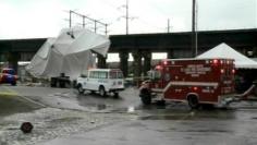 One dead, dozens hurt as storm hits St. Louis bar tent