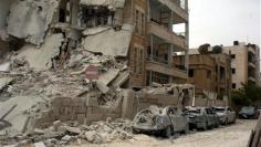 Syria accused of war crimes, rebels kill 15