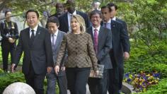 Clinton confronts dissident case ahead of China talks