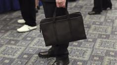 Jobless claims tumble, service sector slows