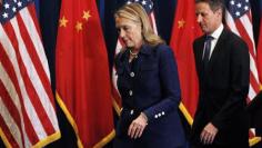 Clinton leaves China as dissident Chen awaits departure