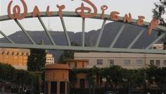 Disney earnings rise despite "John Carter" loss