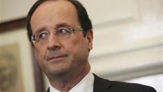 Hollande, France's "Mr Normal", says worth $1.5 million