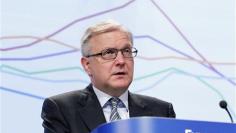 EU's Rehn against debt funded growth, backs Spain plan