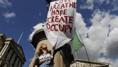 Thousands march against economic gloom in Spain, UK