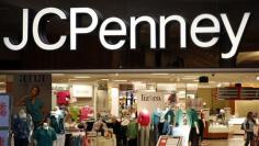 J.C. Penney sales tumble, scraps dividend