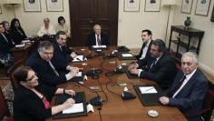 Insight: Greece party talks framed by unreality, punctuated by insults