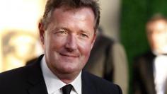 Piers Morgan "showed journalist how to hack phone"