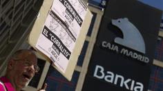 Bankia, Catalonia pile on Spanish debt worries