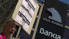 Spain's Bankia eyes stake sales after record bailout