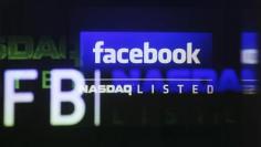 Facebook shares plumb new depths, valuation questioned