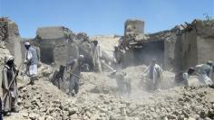 Dozens dead in Afghan bombing, air strike-officials