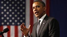 Obama, after tough week, defends record on economy