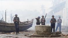 Riot-hit Myanmar town calmer as troops restore order