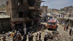 Bomb kills 26 in Pakistan market, 65 wounded