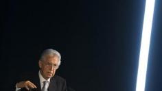 Italy's Monti raises specter of crisis amid protests