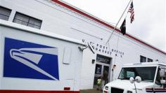 U.S. Postal Service loses $5.2 billion, warns of low cash