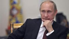 Russia's Putin defiant on Syria, says Romney "mistaken"