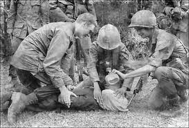 U.S. soldier in Vietnam supervises the waterboarding of a captured North Vietnamese soldier. Bettmann/Corbis 